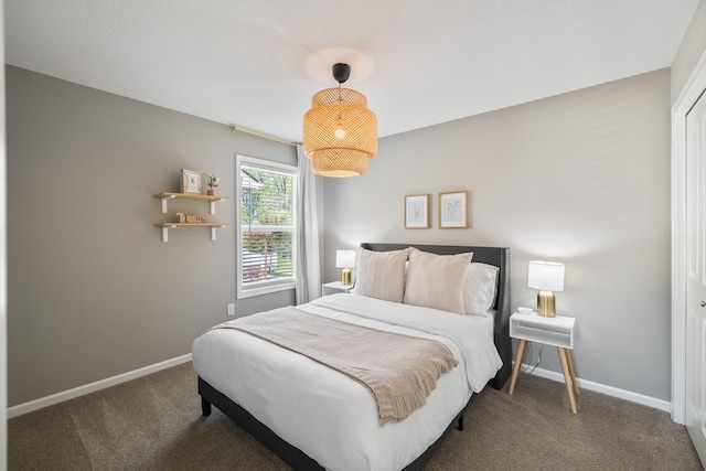 4315 E 48th St, Des Moines, IA 50317 - bedroom featuring carpet floors and baseboards