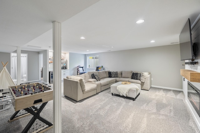 4315 E 48th St, Des Moines, IA 50317 - carpeted living room featuring recessed lighting and baseboards