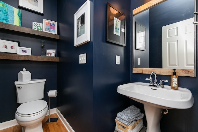 14092 Lake Pointe Dr, Clive, IA 50325 - bathroom with wood finished floors and baseboards