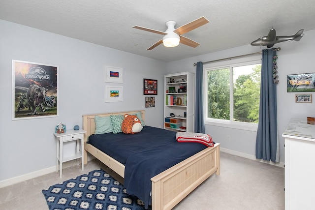 14092 Lake Pointe Dr, Clive, IA 50325 - bedroom with carpet flooring, a textured ceiling, and ceiling fan