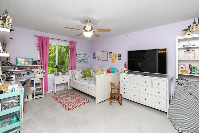 14092 Lake Pointe Dr, Clive, IA 50325 - carpeted bedroom featuring a textured ceiling and a ceiling fan