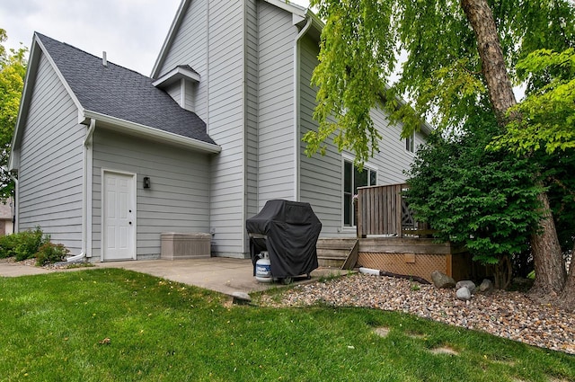 14092 Lake Pointe Dr, Clive, IA 50325 - rear view of property with a lawn, a wooden deck, a patio, and a shingled roof