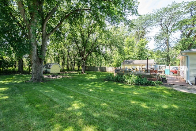 808 Bridge St, Redfield, IA 50233 - view of yard featuring a shed and a deck