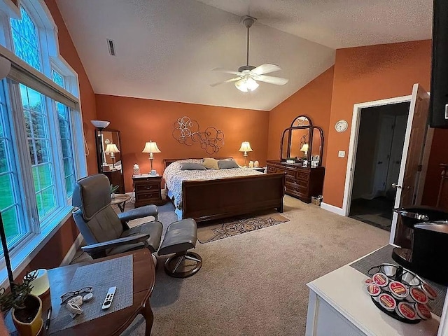 2279 Pheasant Ridge Ln, Ames, IA 50010 - bedroom with lofted ceiling, light colored carpet, and a ceiling fan