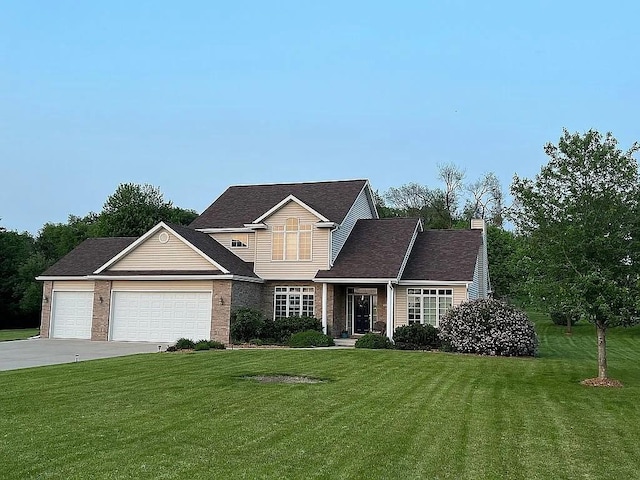 2279 Pheasant Ridge Ln, Ames, IA 50010 - traditional-style home with driveway, a garage, a front yard, and a chimney