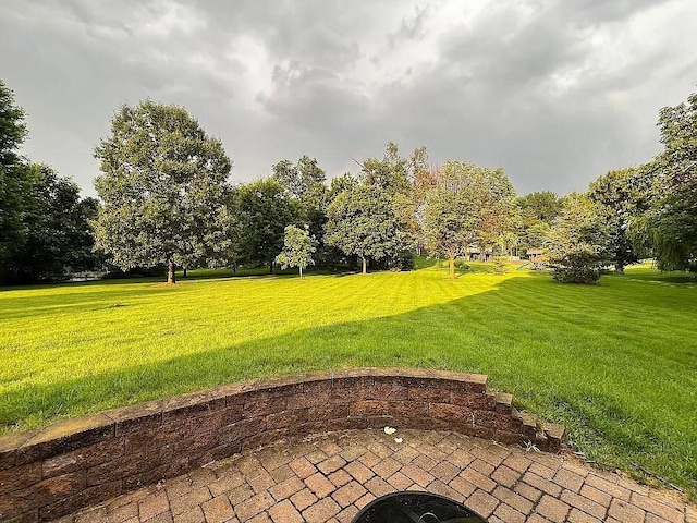 2279 Pheasant Ridge Ln, Ames, IA 50010 - view of grassy yard featuring a patio