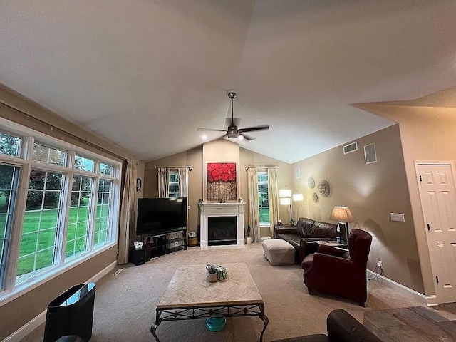 2279 Pheasant Ridge Ln, Ames, IA 50010 - carpeted living area featuring ceiling fan, lofted ceiling, and a fireplace