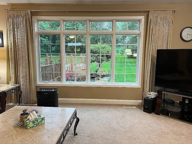 2279 Pheasant Ridge Ln, Ames, IA 50010 - doorway featuring baseboards and carpet flooring