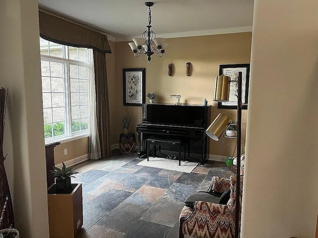 2279 Pheasant Ridge Ln, Ames, IA 50010 - sitting room with stone tile flooring, a chandelier, and ornamental molding