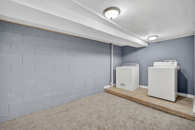 34 E Broadway St, Colfax, IA 50054 - washroom with washing machine and dryer, carpet floors, a textured ceiling, and concrete block wall