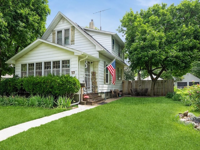 3917 11th St, Des Moines, IA 50313 - bungalow-style house featuring a chimney