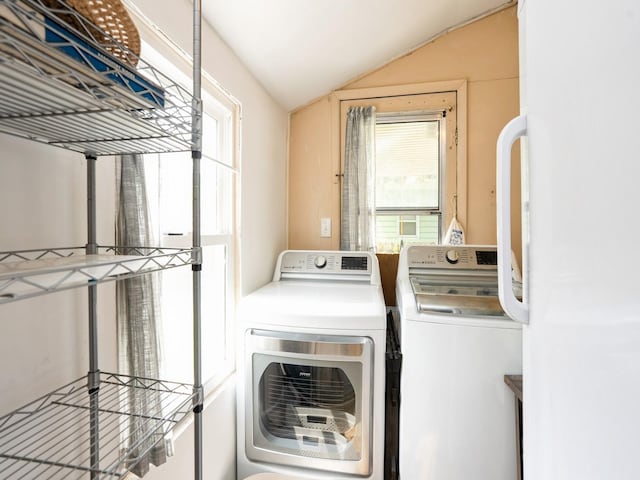 3917 11th St, Des Moines, IA 50313 - washroom with washing machine and clothes dryer and healthy amount of natural light