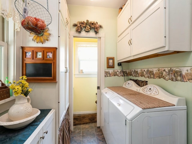4987 E 28th St N, Newton, IA 50208 - washroom with cabinet space, separate washer and dryer, and stone finish floors