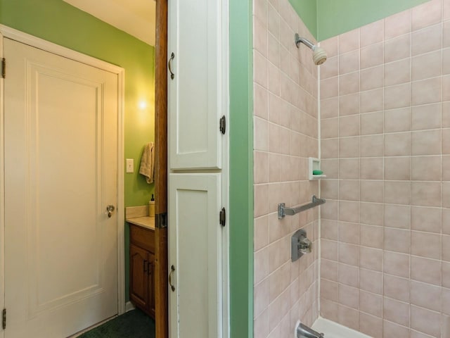 4987 E 28th St N, Newton, IA 50208 - bathroom with vanity and washtub / shower combination