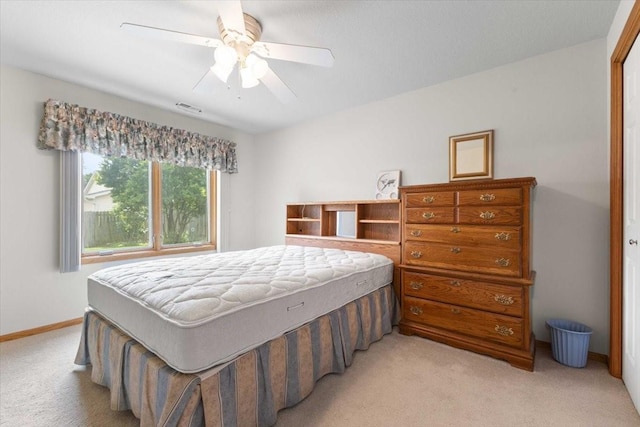 827 SW 46th St, Ankeny, IA 50023 - bedroom with light carpet and ceiling fan