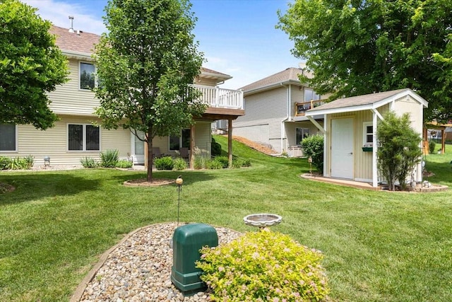 827 SW 46th St, Ankeny, IA 50023 - view of green lawn with a storage shed and a wooden deck