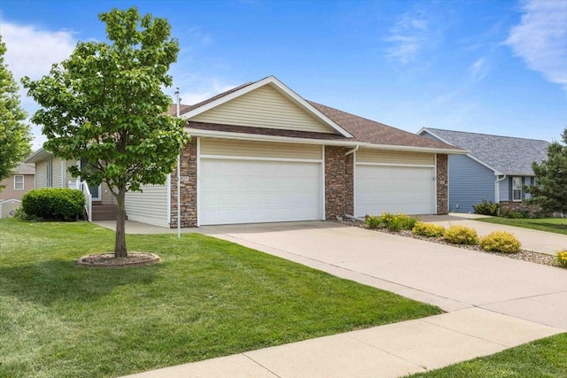 827 SW 46th St, Ankeny, IA 50023 - view of front of property with concrete driveway, an attached garage, a front yard, and brick siding