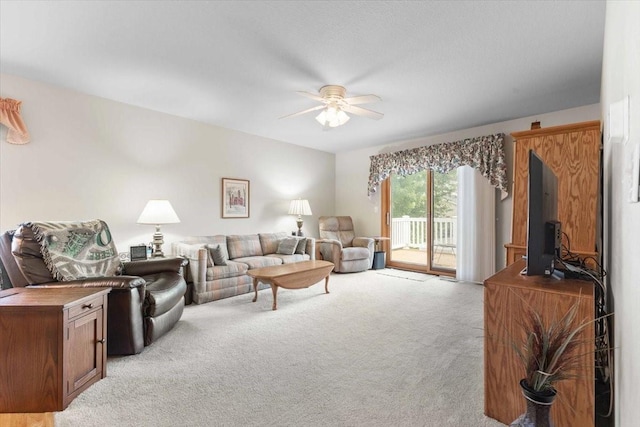 827 SW 46th St, Ankeny, IA 50023 - living area featuring light carpet and ceiling fan