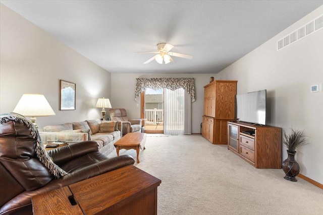 827 SW 46th St, Ankeny, IA 50023 - living area featuring a ceiling fan and light colored carpet