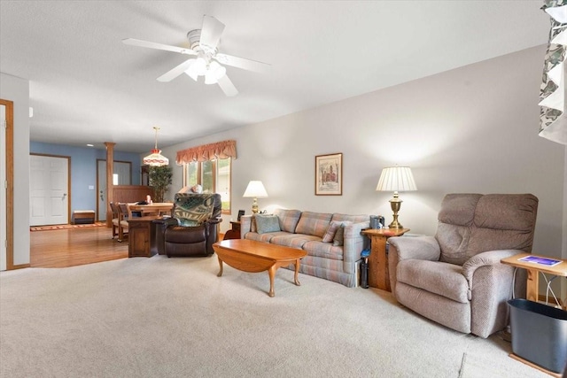 827 SW 46th St, Ankeny, IA 50023 - living room featuring carpet and a ceiling fan
