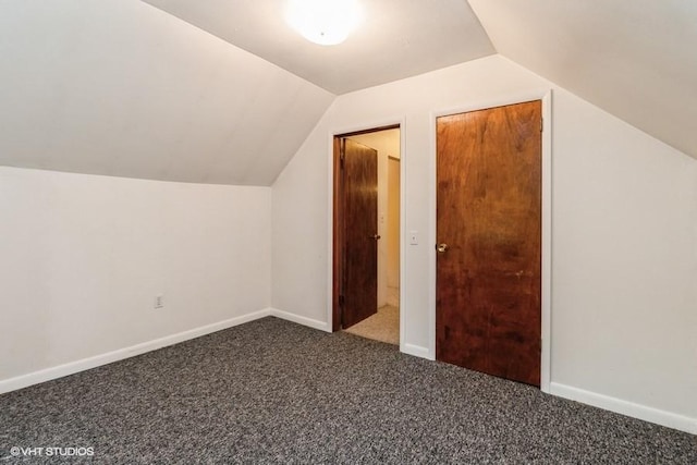 644 N 43rd St, Cumming, IA 50061 - additional living space featuring carpet floors and vaulted ceiling