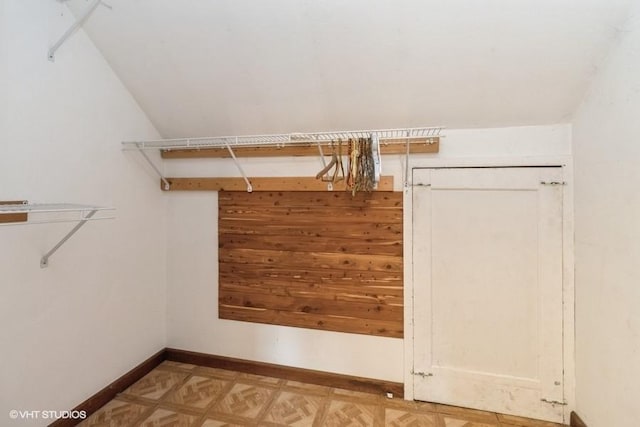 644 N 43rd St, Cumming, IA 50061 - spacious closet featuring lofted ceiling