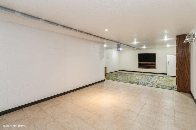 644 N 43rd St, Cumming, IA 50061 - empty room with light floors and recessed lighting