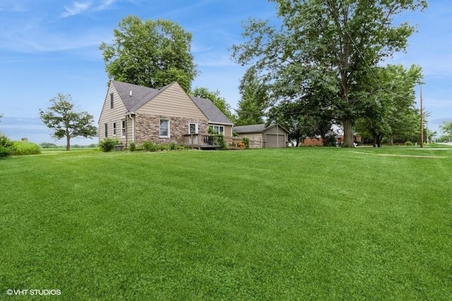 644 N 43rd St, Cumming, IA 50061 - view of front of property with a front yard and stone siding