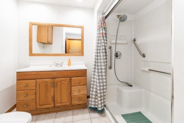 644 N 43rd St, Cumming, IA 50061 - bathroom featuring a shower with shower curtain, vanity, and tile patterned floors