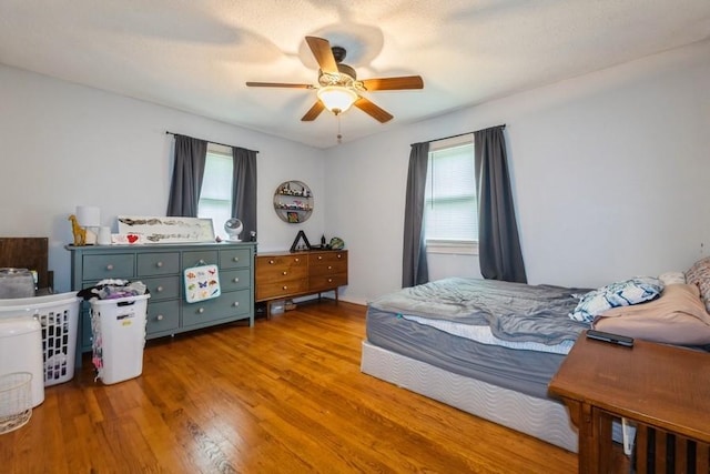 1525 Rapids St, Adel, IA 50003 - bedroom featuring wood finished floors and ceiling fan