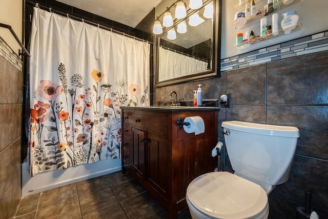 1525 Rapids St, Adel, IA 50003 - full bath with vanity, tile patterned flooring, tile walls, and shower / bath combo