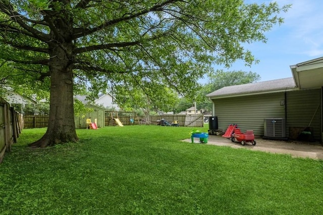 1525 Rapids St, Adel, IA 50003 - fenced backyard featuring a playground