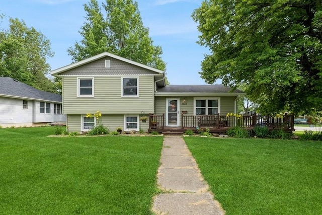 1525 Rapids St, Adel, IA 50003 - tri-level home with a front yard and a wooden deck