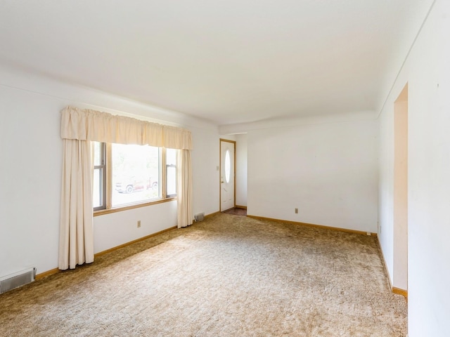 4041 Columbia St, Des Moines, IA 50313 - carpeted spare room featuring healthy amount of natural light