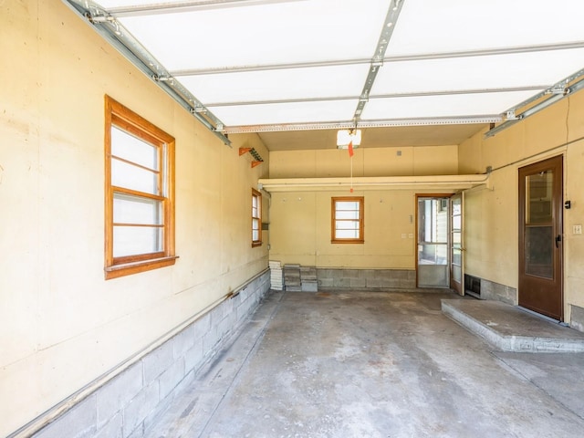 4041 Columbia St, Des Moines, IA 50313 - garage featuring a garage door opener