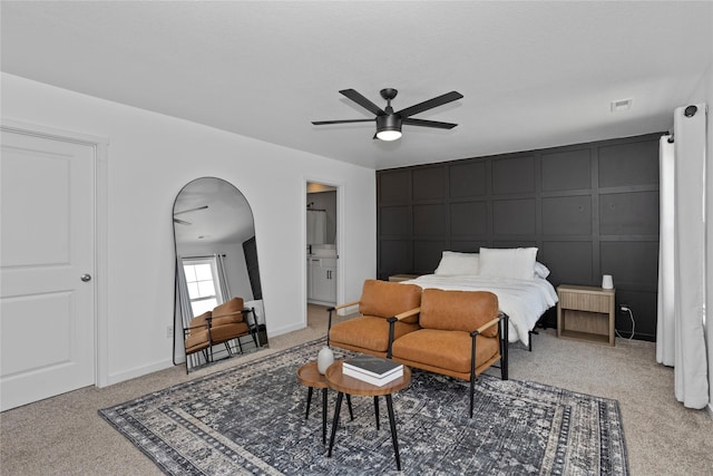 1413 NE Park St, Grimes, IA 50111 - carpeted bedroom with a decorative wall and ceiling fan