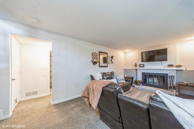 500 NW Valley View Dr, Grimes, IA 50111 - carpeted living room with a textured ceiling and a brick fireplace