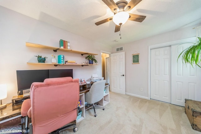 500 NW Valley View Dr, Grimes, IA 50111 - carpeted home office featuring a ceiling fan and baseboards