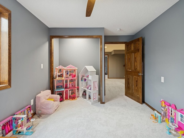 2458 SE 108th St, Runnells, IA 50237 - rec room featuring carpet flooring and a ceiling fan