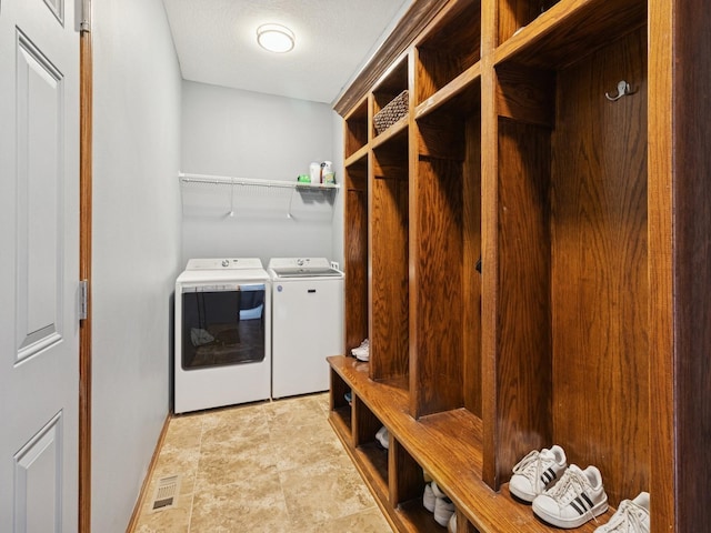 2458 SE 108th St, Runnells, IA 50237 - laundry room with independent washer and dryer and stone finish flooring
