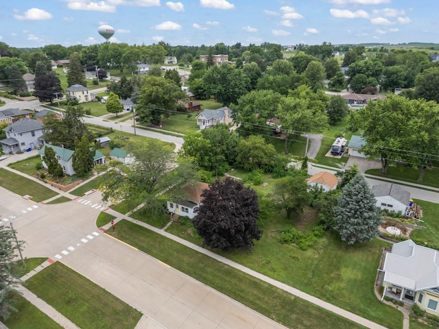 311 E 4th St, Riverside, IA 52327 - aerial perspective of suburban area featuring a tree filled landscape