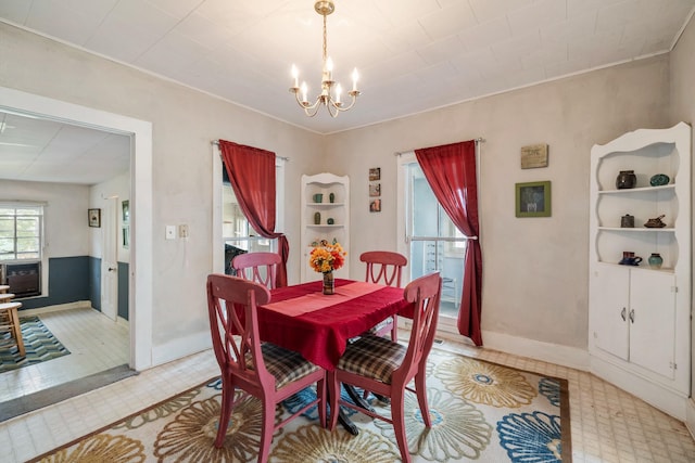 311 E 4th St, Riverside, IA 52327 - dining space with a chandelier and light floors