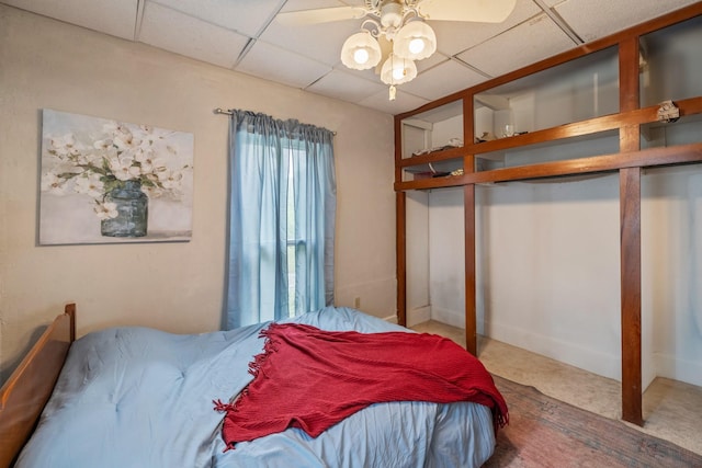 311 E 4th St, Riverside, IA 52327 - carpeted bedroom with a drop ceiling and a closet