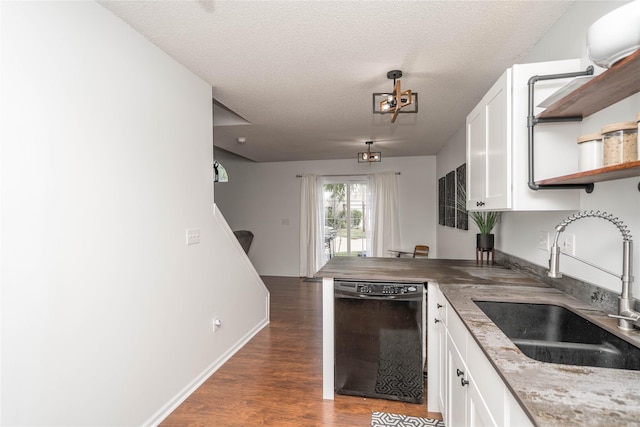 150 S Prairie View Dr Unit 601, West Des Moines, IA 50266 - kitchen featuring dishwasher, white cabinetry, a peninsula, wood finished floors, and a textured ceiling