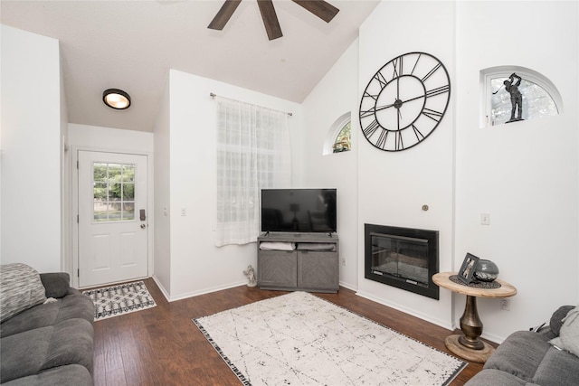 150 S Prairie View Dr Unit 601, West Des Moines, IA 50266 - living room with ceiling fan, dark wood finished floors, a glass covered fireplace, and high vaulted ceiling