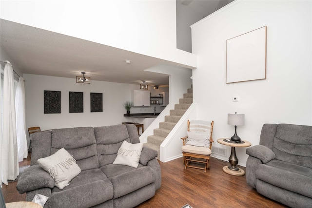 150 S Prairie View Dr Unit 601, West Des Moines, IA 50266 - living room with stairway and dark wood finished floors
