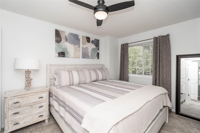 150 S Prairie View Dr Unit 601, West Des Moines, IA 50266 - bedroom featuring carpet and a ceiling fan