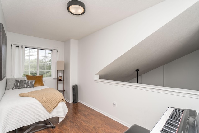 150 S Prairie View Dr Unit 601, West Des Moines, IA 50266 - bedroom featuring wood finished floors and baseboards