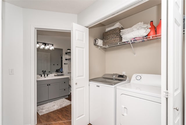 150 S Prairie View Dr Unit 601, West Des Moines, IA 50266 - washroom featuring washing machine and dryer and dark wood-type flooring
