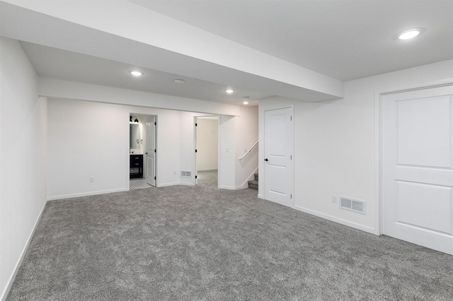 427 Spring Crest Ln, Waukee, IA 50263 - finished basement featuring recessed lighting, carpet, stairs, and water heater